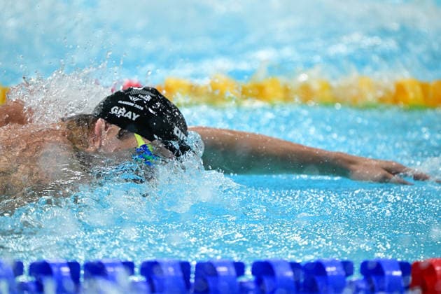 COM26 SWIMMING HEATS, Cameron Gray of New Zealand during the Men™s 100m Freestyle heats at the Glasgow 2026 Commonwealth Games at the Tollcross International Swimming Centre in Glasgow, Scotland, Monday, July 27, 2026. ( NO ARCHIVING, EDITORIAL USE ONLY Glasgow Scotland United Kingdom  Copyright: xDEANxLEWINSx 20260727185153849254