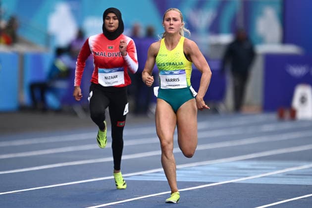 COM26 ATHLETICS, Georgia Harris of Australia (right) competes in the Women s 100m Heats during the the Glasgow 2026 Commonwealth Games at Scotstoun Stadium in Glasgow, Scotland, Monday, July 27, 2026. ( NO ARCHIVING, EDITORIAL USE ONLY Glasgow United Kingdom  Copyright: xJOELxCARRETTx 20260727147906942957