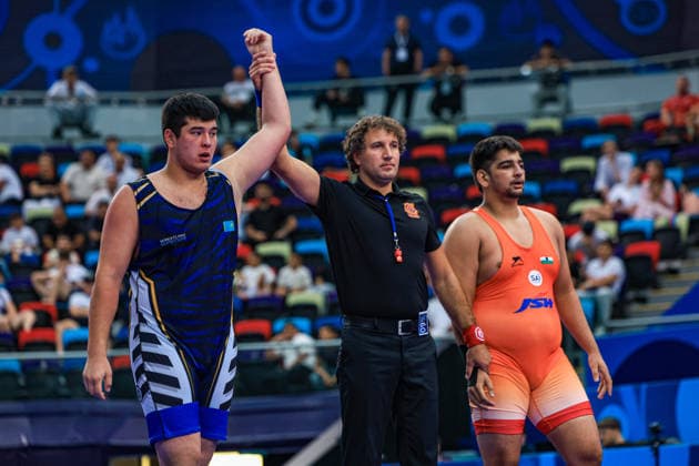 U17, U 17 Wrestling World Championships 110kg GR - Arystan Temergali (KAZ) df. Harsh Dalal (IND) *** U17 Wrestling World Championships, 110 kg Greco-Roman: Arystan Temergali (KAZ) def. Harsh Dalal (IND) Copyright: xUnitedxWorldxWrestlingx xAmirrezx UWW-U17-WC-BAKU-2026