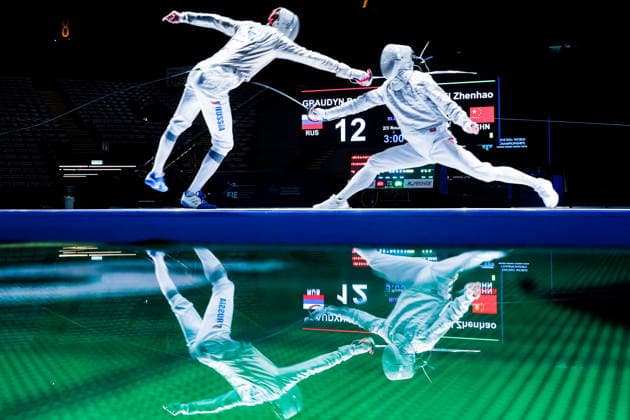 CHINA, HONG KONG - JULY 27, 2026: Russia s Pavel Graudyn (L) and China s Wei Zhenhao compete in the men s individual sabre event at the 2026 Kerry Fencing World Championships. Mikhail Sinitsyn TASS  95533393
