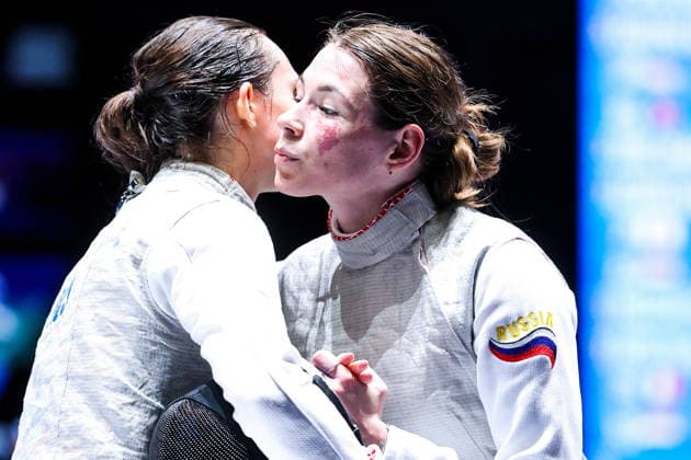 CHINA, HONG KONG - JULY 27, 2026: Russia s Vladislava Peniushkina (L) and Russia s Marta Martyanova after competing the ladies individual foil event at the 2026 Kerry Fencing World Championships. Mikhail Sinitsyn TASS  95532944