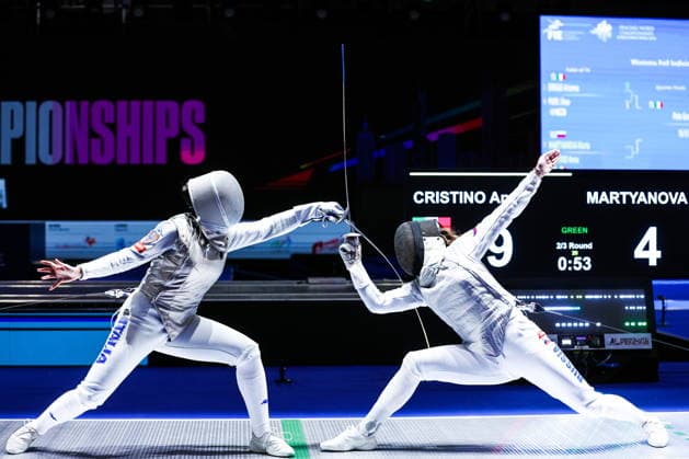 CHINA, HONG KONG - JULY 27, 2026: Italy s Anna Cristino (L) and Russia s Marta Martyanova compete in the ladies individual foil event at the 2026 Kerry Fencing World Championships. Mikhail Sinitsyn TASS  95535215