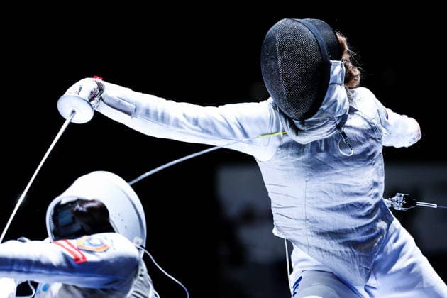 CHINA, HONG KONG - JULY 27, 2026: Italy s Anna Cristino (L) and Russia s Marta Martyanova compete in the ladies individual foil event at the 2026 Kerry Fencing World Championships. Mikhail Sinitsyn TASS  95535217