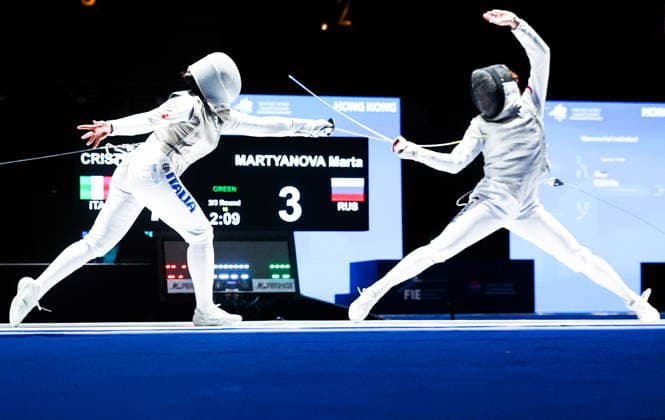 CHINA, HONG KONG - JULY 27, 2026: Italy s Anna Cristino (L) and Russia s Marta Martyanova compete in the ladies individual foil event at the 2026 Kerry Fencing World Championships. Mikhail Sinitsyn TASS  95535224