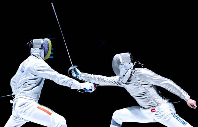 CHINA, HONG KONG - JULY 27, 2026: Romania s Radu Nitu (L) and Russia s Pavel Graudyn compete in the men s individual sabre event at the 2026 Kerry Fencing World Championships. Mikhail Sinitsyn TASS  95535632