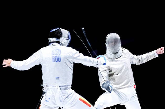 CHINA, HONG KONG - JULY 27, 2026: Romania s Radu Nitu (L) and Russia s Pavel Graudyn compete in the men s individual sabre event at the 2026 Kerry Fencing World Championships. Mikhail Sinitsyn TASS  95535649