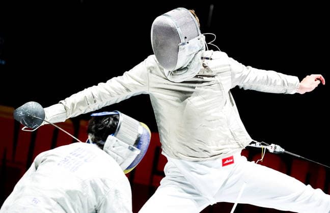 CHINA, HONG KONG - JULY 27, 2026: Romania s Radu Nitu (L) and Russia s Pavel Graudyn compete in the men s individual sabre event at the 2026 Kerry Fencing World Championships. Mikhail Sinitsyn TASS  95535719