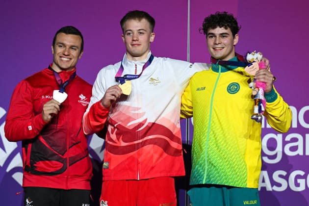 COM26 ARTISTIC GYMNASTICS, Bronze medallist James Hardy of Australia with Gold medallist Luke Whitehouse of England and Silver medallist Rene Cournoyer of Canada on the podium after winning Bronze in the Artistic Gymnastics Men™s Floor Exercise Final during the Glasgow 2026 Commonwealth Games at the Glasgow International Arena in Glasgow, Scotland, Monday, July 27, 2026. ( NO ARCHIVING, EDITORIAL USE ONLY Glasgow Scotland United Kingdom  Copyright: xLUKASxCOCHx 20260727147083758599