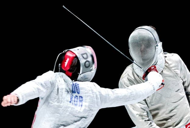 CHINA, HONG KONG - JULY 27, 2026: South Korea s Gyeong-dong Do (L) and Russia s Pavel Graudyn compete in a men s individual sabre event at the 2026 Kerry Fencing World Championships. Mikhail Sinitsyn TASS  95536220