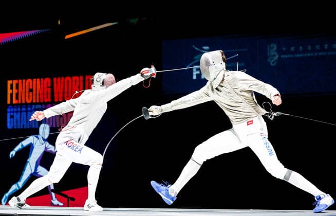 CHINA, HONG KONG - JULY 27, 2026: South Korea s Gyeong-dong Do (L) and Russia s Pavel Graudyn compete in a men s individual sabre event at the 2026 Kerry Fencing World Championships. Mikhail Sinitsyn TASS  95536223