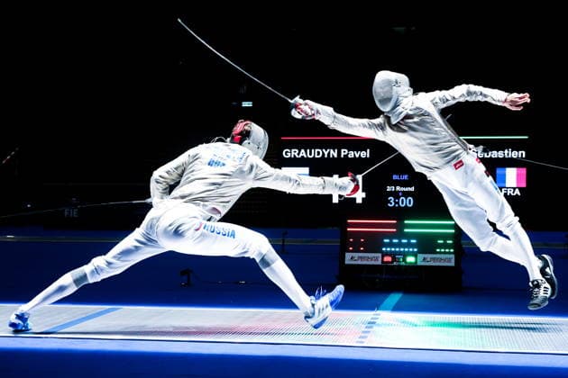 July 27, 2026, Hong Kong, China: Russia s PAVEL GRAUDYN (L) and France s SEBASTIEN PATRICE compete in the men s individual sabre event at the 2026 Kerry Fencing World Championships. Gaudyn won the match and won the event. Fencing 2026: World Championships In Hong Kong  - ZUMAt113 20260727_zaa_t113_248 Copyright: xMikhailxSinitsynx