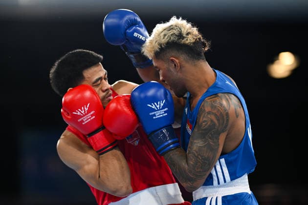 COM26 BOXING, Marion Ah Tong of Samoa (red) fights Tavita Kaoma of Kiribati during the Men™s 70kg Round of 16 match of the Glasgow 2026 Commonwealth Games at SEC Centre in Glasgow, Scotland, Monday, July 27, 2026. ( NO ARCHIVING, EDITORIAL USE ONLY Glasgow Scotland United Kingdom  Copyright: xLUKASxCOCHx 20260728119417339829