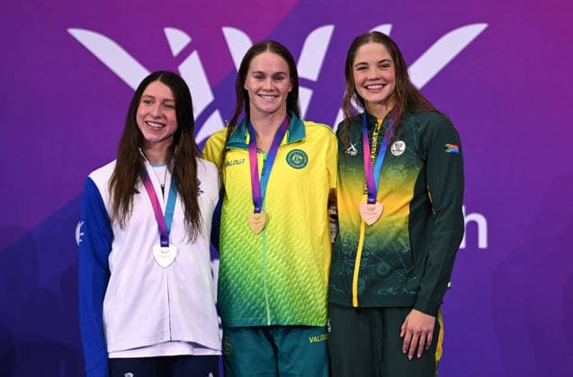 COM26 SWIMMING FINALS, Keanna Macinnes of Scotland, Alex Perkins of Australia and Erin Gallagher of South Africa pose on the podium after the Women™s 100m Butterfly Final at the Glasgow 2026 Commonwealth Games at the Tollcross International Swimming Centre in Glasgow, Scotland, Monday, July 27, 2026. ( NO ARCHIVING, EDITORIAL USE ONLY Glasgow Scotland United Kingdom  Copyright: xDEANxLEWINSx 20260728190542062791