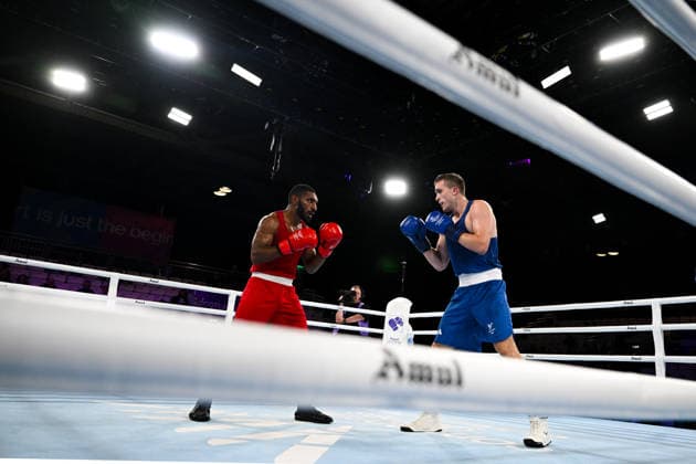COM26 BOXING, Kus Gunua Mua of Papua New Guinea (red) fights Daniel Pitt of Wales during the Men™s 80kg Round of 16 match of the Glasgow 2026 Commonwealth Games at SEC Centre in Glasgow, Scotland, Monday, July 27, 2026. ( NO ARCHIVING, EDITORIAL USE ONLY Glasgow Scotland United Kingdom  Copyright: xLUKASxCOCHx 20260728120033426282