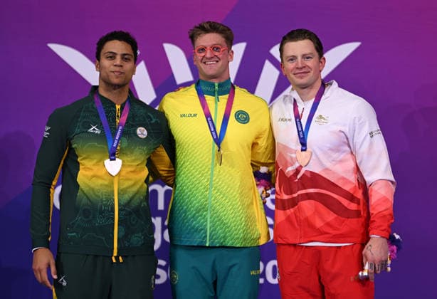 COM26 SWIMMING FINALS, (L-R) Michael Houlie of South Africa, silver, Sam Williamson of Australia, gold, and Adam Ramsay-Peaty of England, bronze, following the Men s 50m Breaststroke final at the Glasgow 2026 Commonwealth Games at the Tollcross International Swimming Centre in Glasgow, Scotland, Monday, July 27, 2026. ( NO ARCHIVING, EDITORIAL USE ONLY Glasgow Scotland United Kingdom  Copyright: xDEANxLEWINSx 20260728136044104546