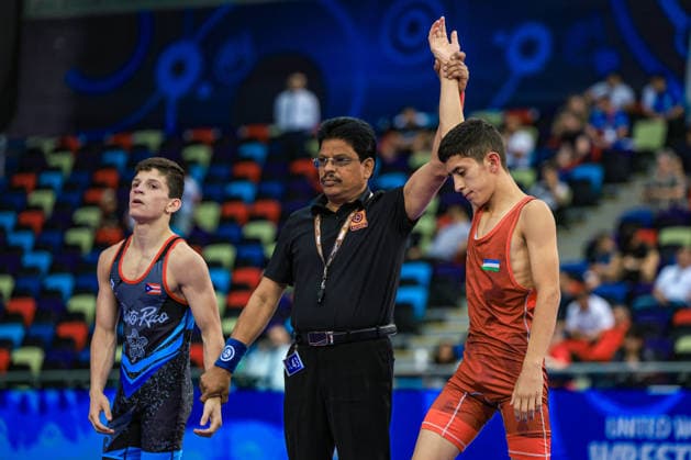 U17, U 17 Wrestling World Championships 45kg GR - Afruzbek Ibragimov (UZB) df. Nelson Villafane Iii (PUR) *** U17 Wrestling World Championships, 45kg Greco-Roman: Afruzbek Ibragimov (UZB) def. Nelson Villafane III (PUR) Copyright: xUnitedxWorldxWrestlingx xAmirrezx UWW-U17-WC-BAKU-2026