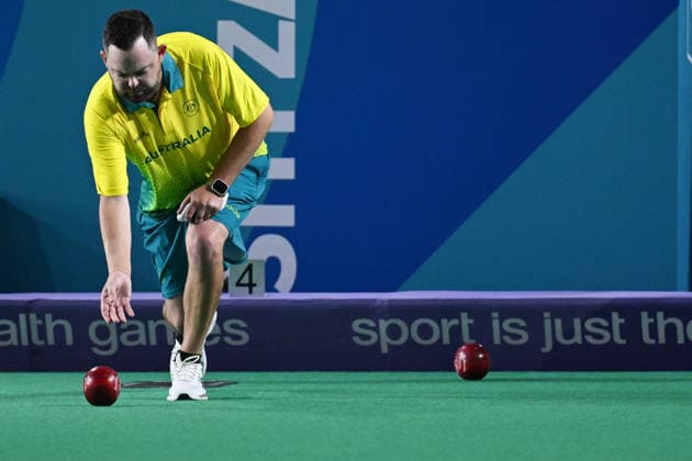 COM26 BOWLS, Aaron Wilson of Australia competes in his bronze medal lawn bowls match at the Glasgow 2026 Commonwealth Games at SEC Centre Hall 3 in Glasgow, Scotland, Tuesday, July 28, 2026. ( NO ARCHIVING, EDITORIAL USE ONLY Glasgow Scotland United Kingdom  Copyright: xDEANxLEWINSx 20260728111636943698