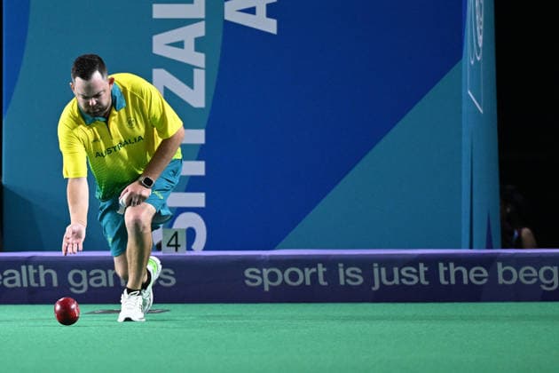 COM26 BOWLS, Aaron Wilson of Australia competes in his bronze medal lawn bowls match at the Glasgow 2026 Commonwealth Games at SEC Centre Hall 3 in Glasgow, Scotland, Tuesday, July 28, 2026. ( NO ARCHIVING, EDITORIAL USE ONLY Glasgow Scotland United Kingdom  Copyright: xDEANxLEWINSx 20260728155489035962