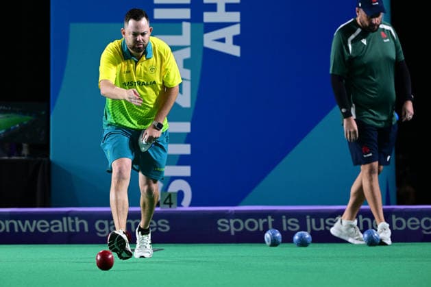 COM26 BOWLS, Aaron Wilson of Australia competes in his bronze medal lawn bowls match against Gary Kelly of Northern Ireland at the Glasgow 2026 Commonwealth Games at SEC Centre Hall 3 in Glasgow, Scotland, Tuesday, July 28, 2026. ( NO ARCHIVING, EDITORIAL USE ONLY Glasgow Scotland United Kingdom  Copyright: xDEANxLEWINSx 20260728174526943781