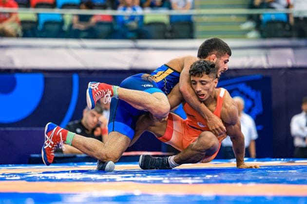 U17, U 17 Wrestling World Championships 60kg GR - Amirreza Saeid Tahmasbpourmarzouni (IRI) df. Darpan Raju Chaudhari (IND) *** U17 Wrestling World Championships, 60 kg Greco-Roman: Amirreza Saeid Tahmasbpourmarzouni (IRI) defeated Darpan Raju Chaudhari (IND) Copyright: xUnitedxWorldxWrestlingx xAmirrezx UWW-U17-WC-BAKU-2026