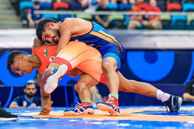 U17, U 17 Wrestling World Championships 60kg GR - Amirreza Saeid Tahmasbpourmarzouni (IRI) df. Darpan Raju Chaudhari (IND) *** U17 Wrestling World Championships, 60 kg Greco-Roman: Amirreza Saeid Tahmasbpourmarzouni (IRI) defeated Darpan Raju Chaudhari (IND) Copyright: xUnitedxWorldxWrestlingx xAmirrezx UWW-U17-WC-BAKU-2026