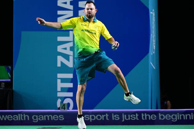 COM26 BOWLS, Aaron Wilson of Australia competes in his bronze medal lawn bowls match against Gary Kelly of Northern Ireland at the Glasgow 2026 Commonwealth Games at SEC Centre Hall 3 in Glasgow, Scotland, Tuesday, July 28, 2026. ( NO ARCHIVING, EDITORIAL USE ONLY Glasgow Scotland United Kingdom  Copyright: xDEANxLEWINSx 20260728144854720012