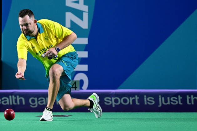 COM26 BOWLS, Aaron Wilson of Australia competes in his bronze medal lawn bowls match against Gary Kelly of Northern Ireland at the Glasgow 2026 Commonwealth Games at SEC Centre Hall 3 in Glasgow, Scotland, Tuesday, July 28, 2026. ( NO ARCHIVING, EDITORIAL USE ONLY Glasgow Scotland United Kingdom  Copyright: xDEANxLEWINSx 20260728161838108947