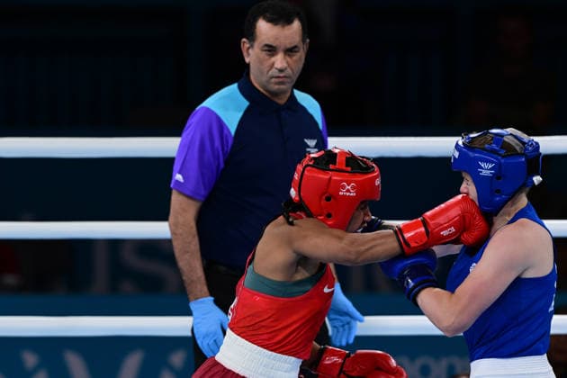 COM26 BOXING, Flora Loga of Papua New Guinea in the Womens 65kg Quarter Final match against Caitlin Rainey of Scotland during the Glasgow 2026 Commonwealth Games at SEC Centre in Glasgow, United Kingdom, Tuesday, July 28, 2026. ( NO ARCHIVING, EDITORIAL USE ONLY, AUSTRALIA ONLY Glasgow Scotland United Kingdom  Copyright: xDEANxLEWEINSx 20260728153612595911