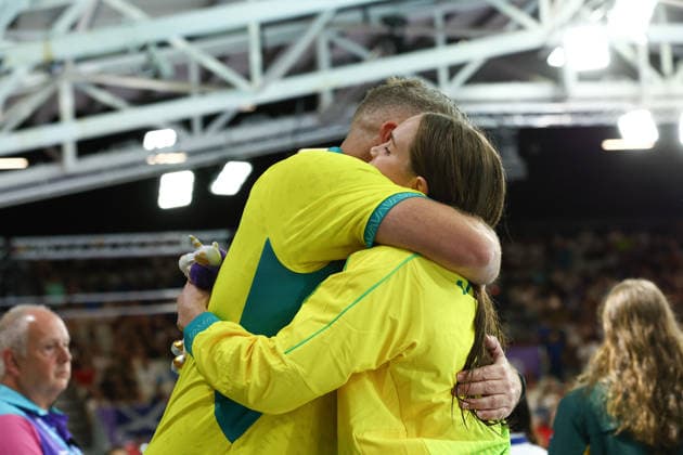 July 27, 2026, Glasgow, Scotland, Great Britain: ALEX PERKINS of Australia is hugged by her coach during the Swimming Women s 100m Butterfly Medal Ceremony of the Commonwealth Games Glasgow 2026 at the Tollcross International Swimming Centre in Glasgow, Scotland. Commowealth Games 2026: Swimming  - ZUMAc179 20260727_zep_c179_474 Copyright: xMickaelxChavetx