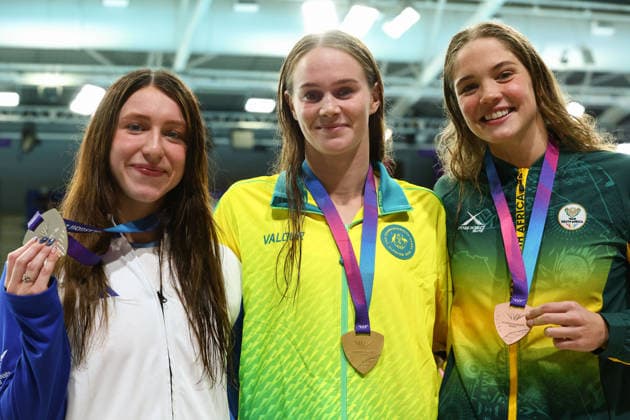 July 27, 2026, Glasgow, Scotland, Great Britain: ALEX PERKINS of Australia (center), KEANNA MACINNES of Scotland (left) and ERIN GALLAGHER of South Africa (right) pose with their gold, silver and bronze medal in the Swimming Women s 100m Butterfly Medal Ceremony of the Commonwealth Games Glasgow 2026 at the Tollcross International Swimming Centre in Glasgow, Scotland. Commowealth Games 2026: Swimming  - ZUMAc179 20260727_zep_c179_481 Copyright: xMickaelxChavetx