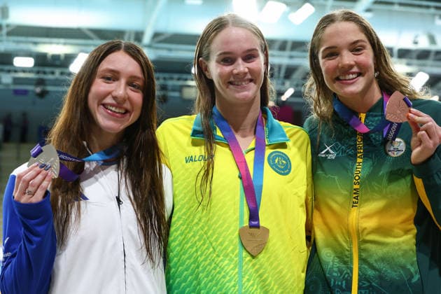 July 27, 2026, Glasgow, Scotland, Great Britain: ALEX PERKINS of Australia (center), KEANNA MACINNES of Scotland (left) and ERIN GALLAGHER of South Africa (right) pose with their gold, silver and bronze medal in the Swimming Women s 100m Butterfly Medal Ceremony of the Commonwealth Games Glasgow 2026 at the Tollcross International Swimming Centre in Glasgow, Scotland. Commowealth Games 2026: Swimming  - ZUMAc179 20260727_zep_c179_484 Copyright: xMickaelxChavetx
