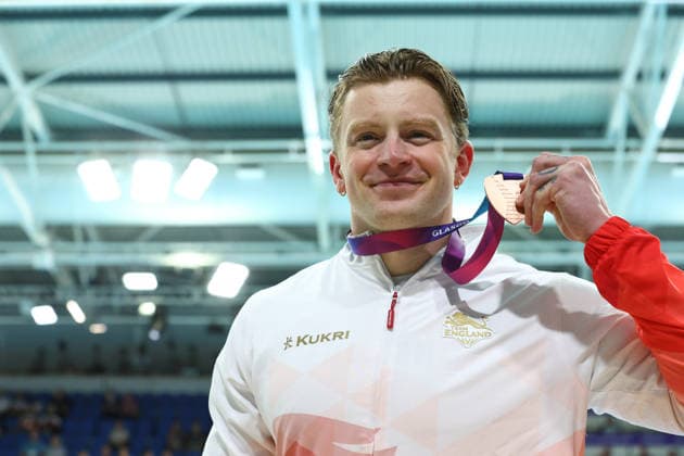 July 27, 2026, Glasgow, Scotland, Great Britain: ADAM RAMSAY-PEATY of England poses with the bronze medal during the Swimming Men s 50m Breaststroke Medal Ceremony of the Commonwealth Games Glasgow 2026 at the Tollcross International Swimming Centre in Glasgow, Scotland. Glasgow Great Britain - ZUMAc179 20260727_zep_c179_505 Copyright: xMickaelxChavetx