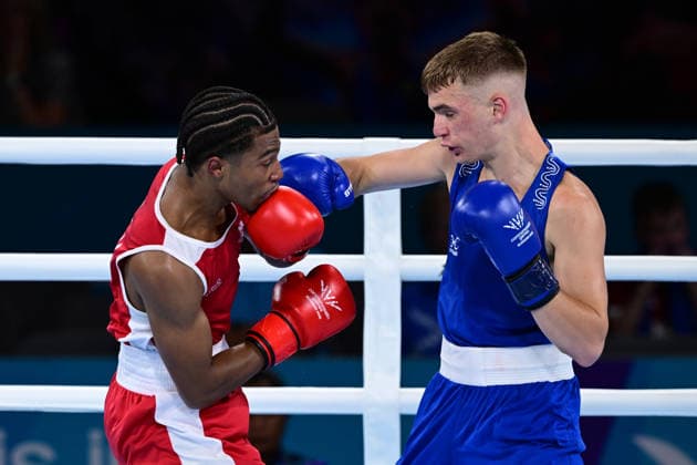 COM26 BOXING, Jacob Cassar (blue) of Australia in action during his Quarter Final match against Gabriel Labrie (red) of Canada during the Glasgow 2026 Commonwealth Games at SEC Centre in Glasgow, United Kingdom, Tuesday, July 28, 2026. ( NO ARCHIVING, EDITORIAL USE ONLY, AUSTRALIA ONLY Glasgow Scotland United Kingdom  Copyright: xDEANxLEWEINSx 20260728116097490379