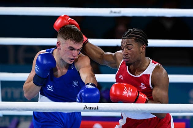 COM26 BOXING, Jacob Cassar (blue) of Australia in action during his Quarter Final match against Gabriel Labrie (red) of Canada during the Glasgow 2026 Commonwealth Games at SEC Centre in Glasgow, United Kingdom, Tuesday, July 28, 2026. ( NO ARCHIVING, EDITORIAL USE ONLY, AUSTRALIA ONLY Glasgow Scotland United Kingdom  Copyright: xDEANxLEWEINSx 20260728140464774150