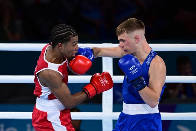COM26 BOXING, Jacob Cassar (blue) of Australia in action during his Quarter Final match against Gabriel Labrie (red) of Canada during the Glasgow 2026 Commonwealth Games at SEC Centre in Glasgow, United Kingdom, Tuesday, July 28, 2026. ( NO ARCHIVING, EDITORIAL USE ONLY, AUSTRALIA ONLY Glasgow Scotland United Kingdom  Copyright: xDEANxLEWEINSx 20260728158703757951