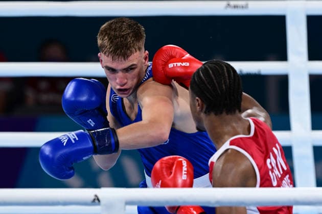 COM26 BOXING, Jacob Cassar (blue) of Australia in action during his Quarter Final match against Gabriel Labrie (red) of Canada during the Glasgow 2026 Commonwealth Games at SEC Centre in Glasgow, United Kingdom, Tuesday, July 28, 2026. ( NO ARCHIVING, EDITORIAL USE ONLY, AUSTRALIA ONLY Glasgow Scotland United Kingdom  Copyright: xDEANxLEWEINSx 20260728166194374401