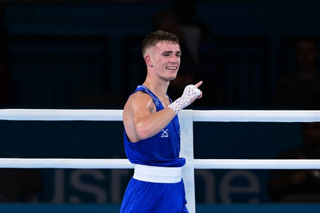COM26 BOXING, Jacob Cassar (blue) of Australia celebrates his win in his Quarter Final match against Gabriel Labrie (red) of Canada during the Glasgow 2026 Commonwealth Games at SEC Centre in Glasgow, United Kingdom, Tuesday, July 28, 2026. ( NO ARCHIVING, EDITORIAL USE ONLY, AUSTRALIA ONLY Glasgow Scotland United Kingdom  Copyright: xDEANxLEWEINSx 20260728198085692111