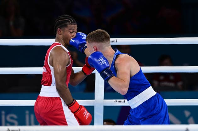 COM26 BOXING, Jacob Cassar (blue) of Australia in action during his Quarter Final match against Gabriel Labrie (red) of Canada during the Glasgow 2026 Commonwealth Games at SEC Centre in Glasgow, United Kingdom, Tuesday, July 28, 2026. ( NO ARCHIVING, EDITORIAL USE ONLY, AUSTRALIA ONLY Glasgow Scotland United Kingdom  Copyright: xDEANxLEWEINSx 20260728141791994616