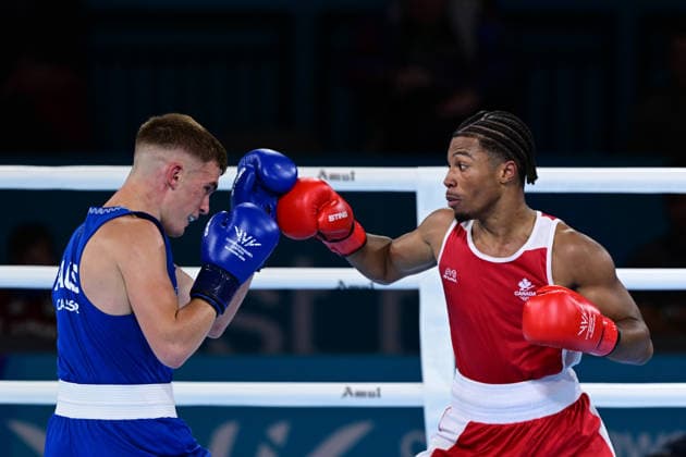 COM26 BOXING, Jacob Cassar (blue) of Australia in action during his Quarter Final match against Gabriel Labrie (red) of Canada during the Glasgow 2026 Commonwealth Games at SEC Centre in Glasgow, United Kingdom, Tuesday, July 28, 2026. ( NO ARCHIVING, EDITORIAL USE ONLY, AUSTRALIA ONLY Glasgow Scotland United Kingdom  Copyright: xDEANxLEWEINSx 20260728169490452295
