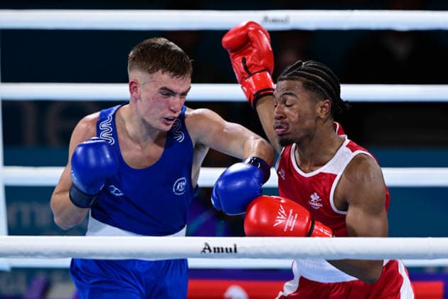 COM26 BOXING, Jacob Cassar (blue) of Australia in action during his Quarter Final match against Gabriel Labrie (red) of Canada during the Glasgow 2026 Commonwealth Games at SEC Centre in Glasgow, United Kingdom, Tuesday, July 28, 2026. ( NO ARCHIVING, EDITORIAL USE ONLY, AUSTRALIA ONLY Glasgow Scotland United Kingdom  Copyright: xDEANxLEWEINSx 20260728147086822568