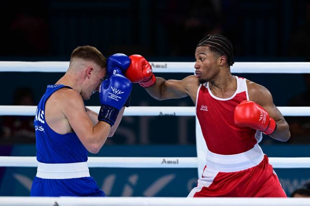 COM26 BOXING, Jacob Cassar (blue) of Australia in action during his Quarter Final match against Gabriel Labrie (red) of Canada during the Glasgow 2026 Commonwealth Games at SEC Centre in Glasgow, United Kingdom, Tuesday, July 28, 2026. ( NO ARCHIVING, EDITORIAL USE ONLY, AUSTRALIA ONLY Glasgow Scotland United Kingdom  Copyright: xDEANxLEWEINSx 20260728154587375065