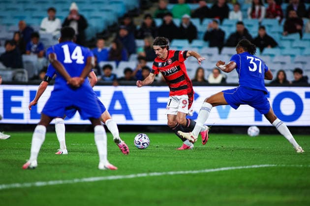 RECORD DATE NOT STATED 28th July 2026, Accor Stadium, Sydney, New South Wales, Australia; Friendly Football, Chelsea versus Western Sydney Wanderers; Aydan Hammond of Western Sydney Wanderers pushes the ball past Tayo Subuloye of Chelsea FC KevinxManning