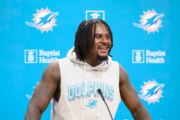 MIAMI GARDENS, FL - JULY 28: Miami Dolphins quarterback Malik Willis smiles as he speaks to the media during the Miami Dolphins Training Camp on August 28, 2026, at the Baptist Health Training Complex in Miami Gardens, FL. (Photo by Doug Murray Icon Sportswire) NFL, American Football Herren, USA JUL 28 Dolphins Training Camp EDITORIAL USE ONLY Icon79626072820