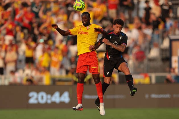Como, Italy, 28th July 2026. Abdallah Sima of Racing Club de Lens challenges for an aerial ball with Charlie Walker-Smith of Crystal Palace FC during the Crystal Palace vs Racing Club de Lens Pre Season Friendly match at Stadio Giuseppe Sinigaglia, Como. Picture credit should read: Jonathan Moscrop Sportimage EDITORIAL USE ONLY. No use with unauthorised audio, video, data, fixture lists, club league logos or live services. Online in-match use limited to 120 images, no video emulation. No use in betting, games or single club league player publications. SPI_011_JM_PALACE_LENS SPI-4866-0009