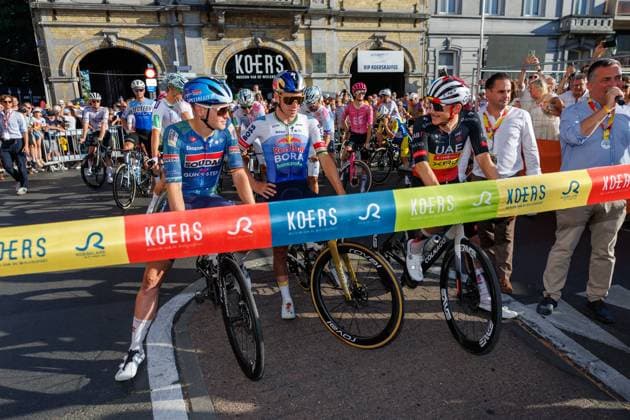 Belgian Tim Merlier of Soudal Quick-Step, Belgian Remco Evenepoel of Red Bull-BORA-hansgrohe and Belgian Rune Herregodts of UAE Team Emirates-XRG pictured at the start of the Natourcriterium Roeselare cycling event, Tuesday 28 July 2026 in Roeselare. The traditional criteriums are local showcases for which mainly cyclists who rode the Tour de France are invited. KURTxDESPLENTER  x182243782x