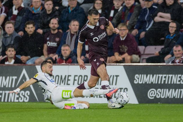 SOCCER - UEFA CL, Hearts vs Sturm EDINBURGH,SCOTLAND,28.JUL.26 - SOCCER - UEFA Champions League, qualification, Heart of Midlothian FC vs SK Sturm Graz. Image shows Juergen Heil (Sturm) and Oisin McEntee (Hearts).  GEPAxpictures xMatthiasxTrinkl