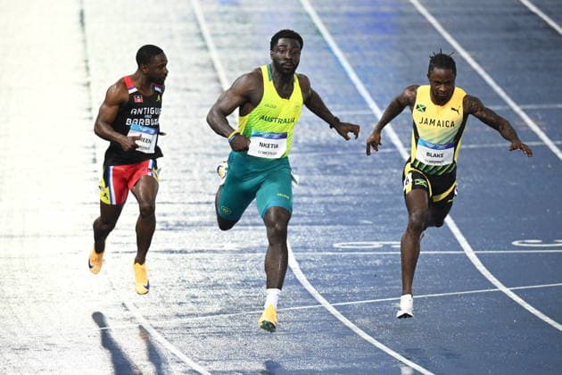 COM26 ATHLETICS, Edward Nketia of Australia (C) competes during the Mens 100m Semi-Finals during the Glasgow 2026 Commonwealth Games at Scotstoun Stadium in Glasgow, Scotland, Tuesday, July 28, 2026. ( NO ARCHIVING, EDITORIAL USE ONLY Glasgow United Kingdom  Copyright: xJOELxCARRETTx 20260729173731864432