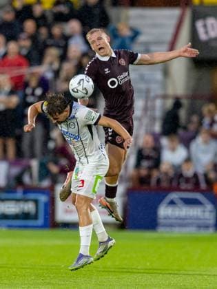Simon Seidl, of SK Sturm Graz and Harry Milne of Heart of Midlothian compete for possession of the ball during the Hearts v Sturm Graz second leg of their Champions League second qualifying round at Tynecastle Stadium on Tuesday 28th July 2026 Heart of Midlothian v Sturm Graz, UEFA Champions League, 2nd Qualifying Round, 2nd Leg, Football, Tynecastle Park, Edinburgh, Scotland, UK - 28 Jul 2026Edinburgh Tynecastle Park Scotland United Kingdom  Copyright: xAlanxRennie Shutterstockx 17015998bl