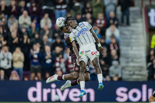 SOCCER - UEFA CL, Hearts vs Sturm EDINBURGH,SCOTLAND,28.JUL.26 - SOCCER - UEFA Champions League, qualification, Heart of Midlothian FC vs SK Sturm Graz. Image shows Seedy Jatta (Sturm) and Malachi Fagan-Walcott (Hearts).  GEPAxpictures xMatthiasxTrinkl