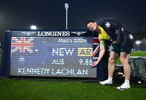COM26 ATHLETICS, Silver medalist Lachlan Kennedy of Australia poses after setting a new Australian record following the Mens 100m Final during the Glasgow 2026 Commonwealth Games at Scotstoun Stadium in Glasgow, Scotland, Tuesday, July 28, 2026. ( NO ARCHIVING, EDITORIAL USE ONLY Glasgow United Kingdom  Copyright: xJOELxCARRETTx 20260729198630820896